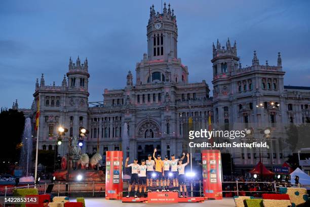 Alejandro Valverde Belmonte of Spain and Movistar Team celebrates with his teammates tribute to his farewell to the professional cycling on the...