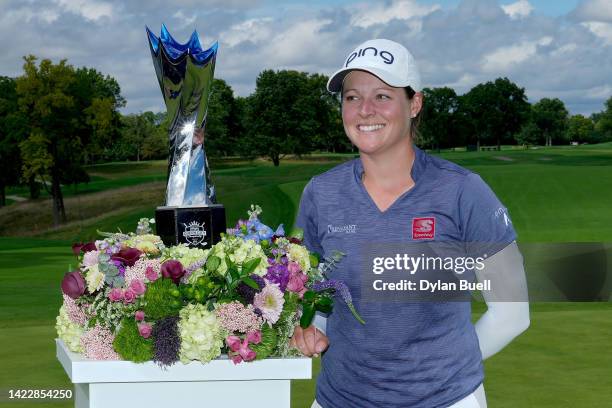 Ally Ewing of the United States poses with the trophy after winning the Kroger Queen City Championship presented by P&G at Kenwood Country Club on...