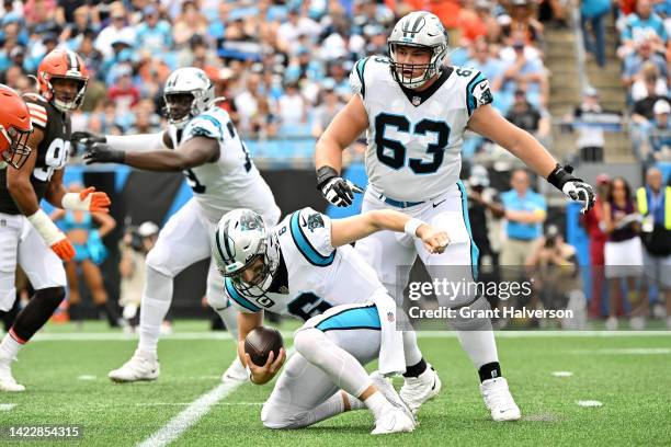 Baker Mayfield of the Carolina Panthers falls during the second quarter against the Cleveland Browns at Bank of America Stadium on September 11, 2022...