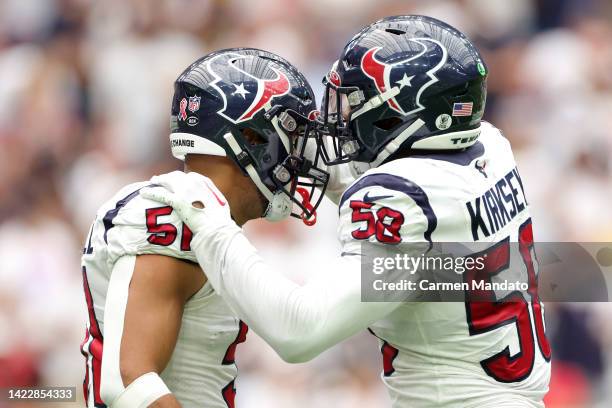 Kamu Grugier-Hill and Christian Kirksey of the Houston Texans celebrate a third quarter stop against the Indianapolis Colts at NRG Stadium on...