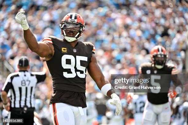 Myles Garrett of the Cleveland Browns reacts after sacking Baker Mayfield of the Carolina Panthers during the third quarter at Bank of America...