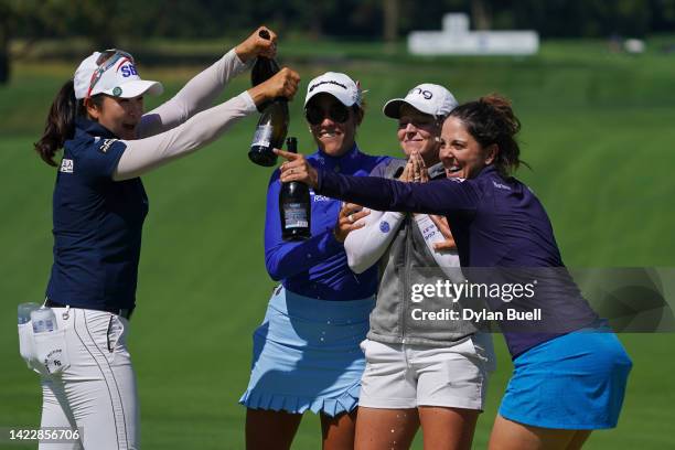 Lim Kim of South Korea, Maria Fassi of Mexico, Ally Ewing of the United States, and Emma Talley of the United States celebrate after Ewing won the...