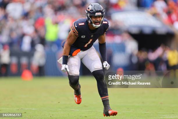 Quarterback Justin Fields of the Chicago Bears celebrates after throwing a touchdown pass during the fourth quarter against the San Francisco 49ers...