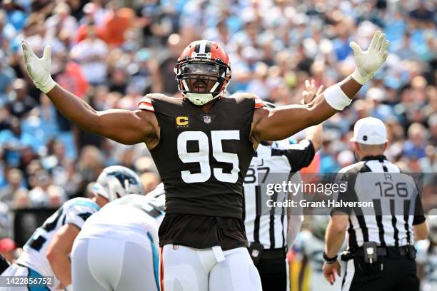 Myles Garrett of the Cleveland Browns reacts after sacking Baker Mayfield of the Carolina Panthers during the third quarter at Bank of America...