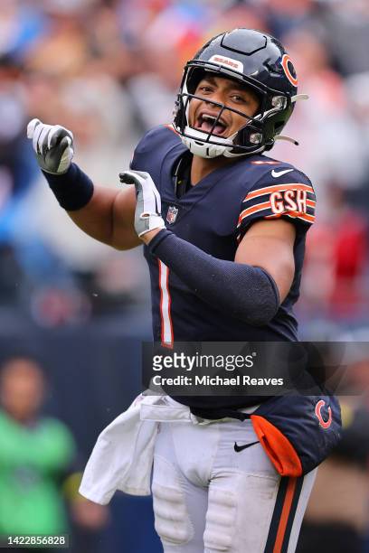 Quarterback Justin Fields of the Chicago Bears celebrates after throwing a touchdown pass during the fourth quarter against the San Francisco 49ers...