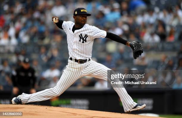 Domingo German of the New York Yankees pitches in the top of the first inning against the Tampa Bay Rays at Yankee Stadium on September 11, 2022 in...