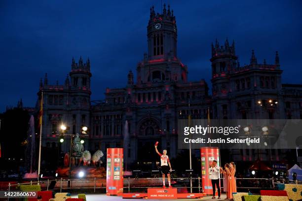 Marc Soler Gimenez of Spain and UAE Team Emirates celebrates winning the trophy for the most combative rider on the podium ceremony and in the Plaza...