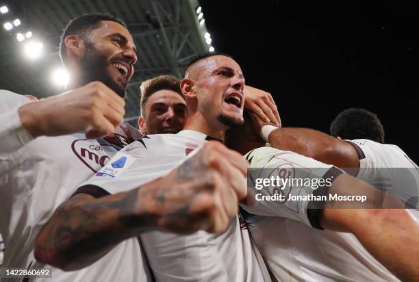 Pasquale Mazzocchi of Salernitana celebrates with teammates after Krzysztof Piatek scores their team's second goal from the penalty spot during the...