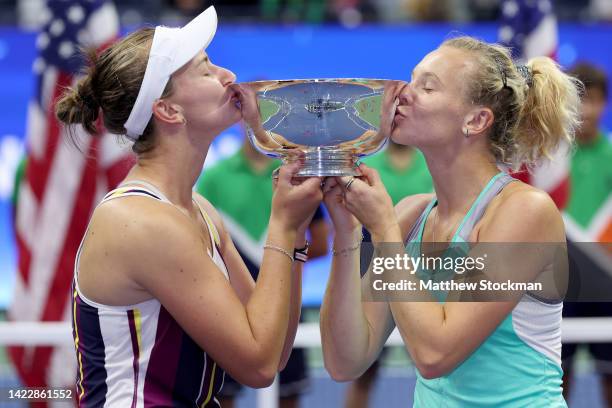 Katerina Siniakova, right, of the Czech Republic and partner Barbora Krejcikova of the Czech Republic kiss the trophy after defeating Taylor Townsend...