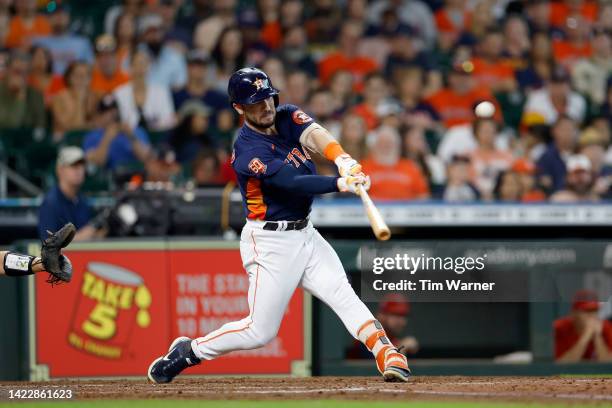 Alex Bregman of the Houston Astros hits a grand slam in the third inning against the Los Angeles Angels at Minute Maid Park on September 11, 2022 in...
