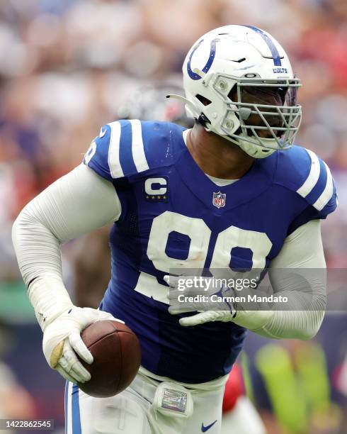 DeForest Buckner of the Indianapolis Colts recovers a fumble during the fourth quarter against the Houston Texans at NRG Stadium on September 11,...