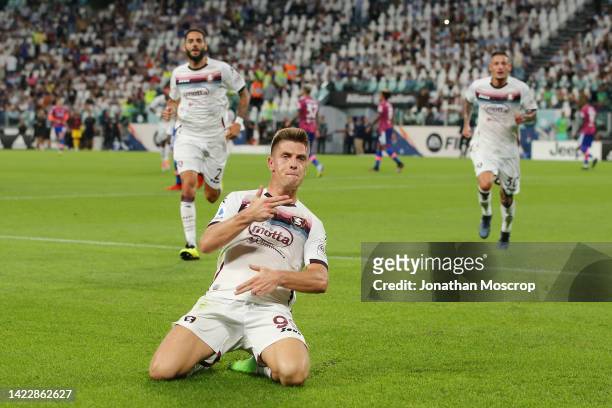Krzysztof Piatek of Salernitana celebrates after scoring their team's second goal from the penalty spot during the Serie A match between Juventus and...
