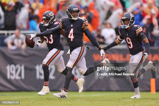 Safety Eddie Jackson of the Chicago Bears celebrates with linebacker Nicholas Morrow of the Chicago Bears and safety Jaquan Brisker of the Chicago...