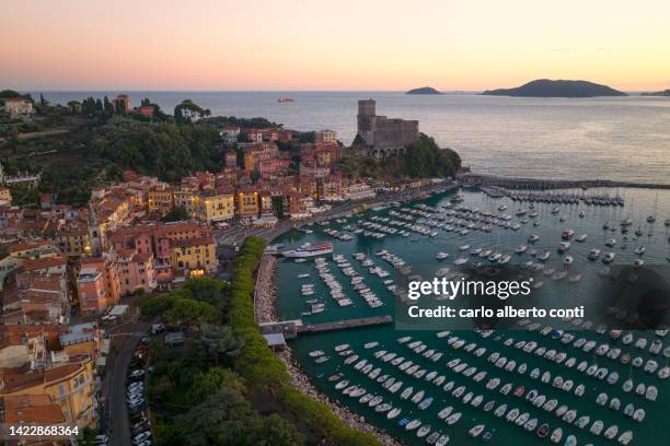 aerial view taken by drone of lerici bay during an summer sunset,  lerici, la spezia, liguria, italy, europe - mar de liguria fotografías e imágenes de stock