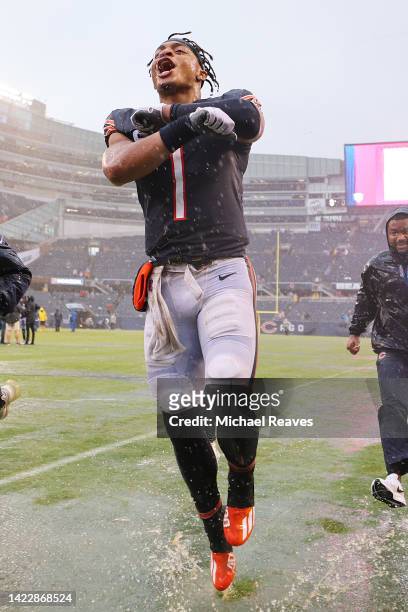 Quarterback Justin Fields of the Chicago Bears celebrates after his team's 19-10 win against the San Francisco 49ers at Soldier Field on September...