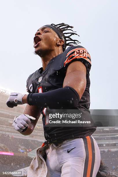 Justin Fields of the Chicago Bears celebrates after defeating the San Francisco 49ers 19-10 at Soldier Field on September 11, 2022 in Chicago,...
