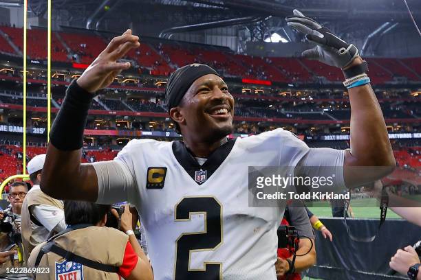 Quarterback Jameis Winston of the New Orleans Saints smiles after his team's 27-26 win against the Atlanta Falcons at Mercedes-Benz Stadium on...