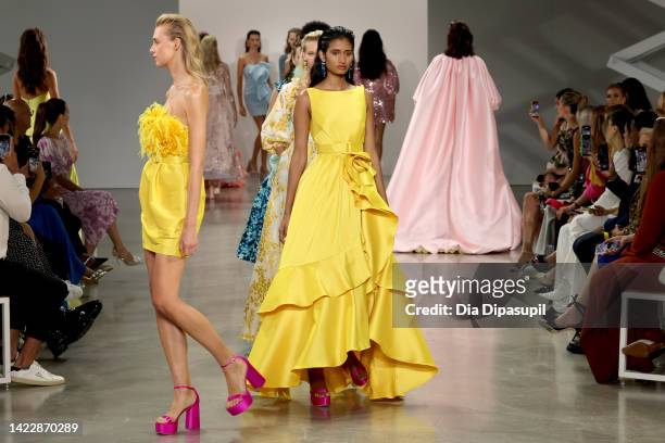 Models walk the runway for the Badgley Mischka Spring 2023 Runway Show at Gallery at Spring Studios on September 11, 2022 in New York City.