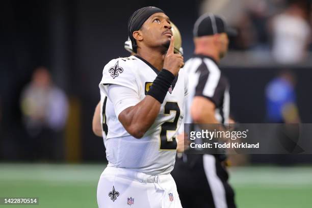 Quarterback Jameis Winston of the New Orleans Saints points to the sky after his team's 27-26 win against the Atlanta Falcons at Mercedes-Benz...