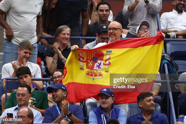 Fan holds up the flag of Spain during the Men’s Singles Final match between Casper Ruud of Norway and Carlos Alcaraz of Spain on Day Fourteen of the...