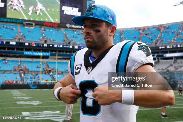 Quarterback Baker Mayfield of the Carolina Panthers walks off the field following their 26-24 loss to the Cleveland Browns at Bank of America Stadium...