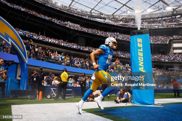 Justin Herbert of the Los Angeles Chargers takes the field prior to the game against the Las Vegas Raiders at SoFi Stadium on September 11, 2022 in...