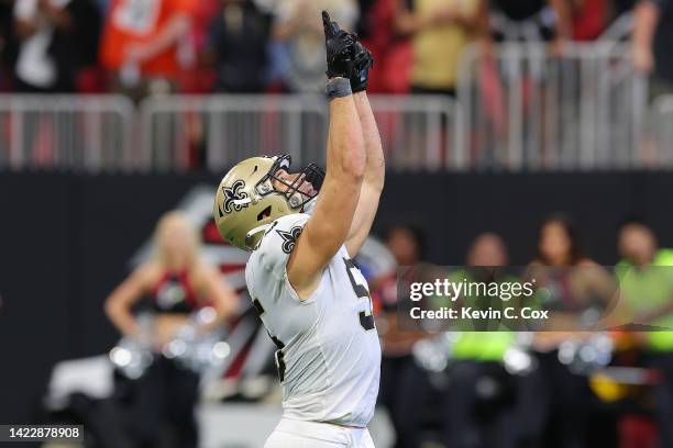 Linebacker Kaden Elliss of the New Orleans Saints reacts after a potential game winning field goal attempt was blocked during the fourth quarter...