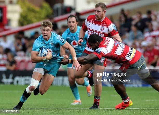 Charlie Atkinson of Wasps goes past Albert Tuisue during the Gallagher Premiership Rugby match between Gloucester Rugby and Wasps at Kingsholm...