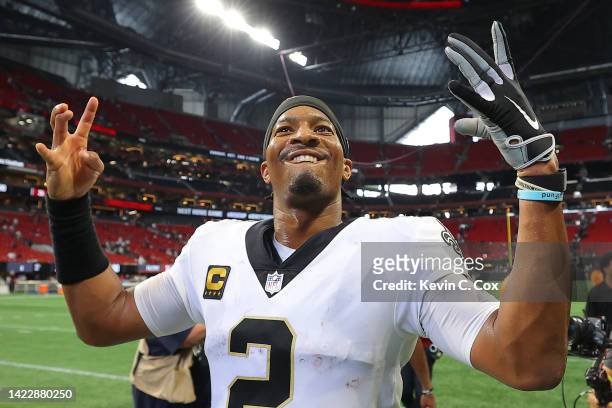 Quarterback Jameis Winston of the New Orleans Saints celebrates after his team's 27-26 win against the Atlanta Falcons at Mercedes-Benz Stadium on...