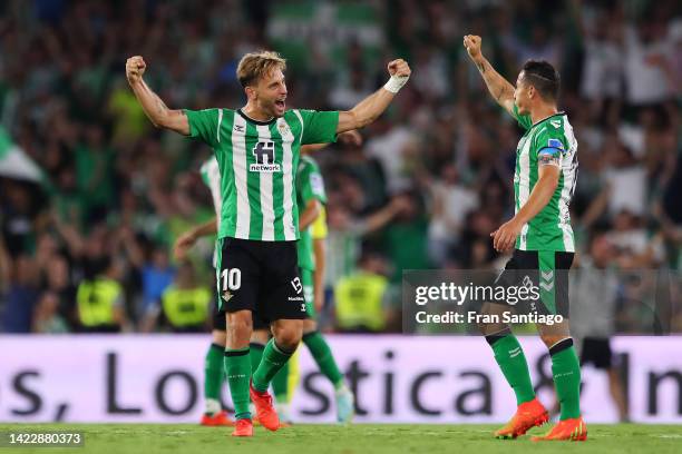 Sergio Canales and Andres Guardado of Real Betis celebrates victory following the LaLiga Santander match between Real Betis and Villarreal CF at...