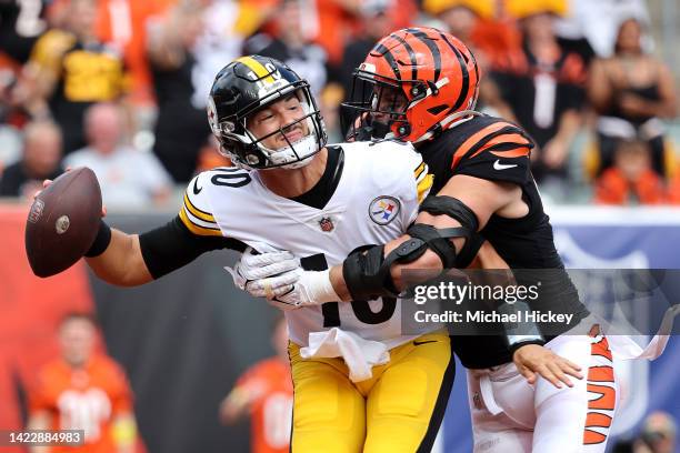 Linebacker Logan Wilson of the Cincinnati Bengals hits quarterback Mitch Trubisky of the Pittsburgh Steelers during the second half at Paycor Stadium...