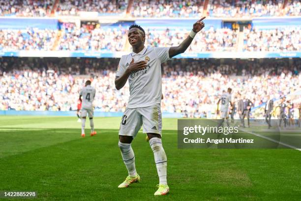 Vinicius Junior of Real Madrid CF celebrates after scoring their side's second goal during the LaLiga Santander match between Real Madrid CF and RCD...