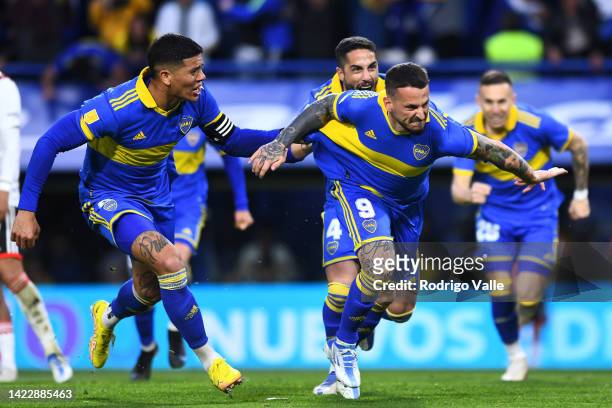 Darío Benedetto of Boca Juniors celebrates after scoring the first goal of his team during a match between Boca Juniors and River Plate as part of...