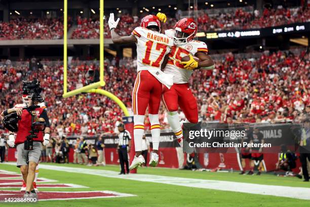 Wide receiver Mecole Hardman and running back Clyde Edwards-Helaire of the Kansas City Chiefs celebrate during the first half of the game against the...