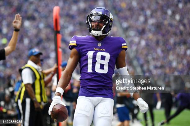 Justin Jefferson of the Minnesota Vikings celebrates after scoring a touchdown during the first quarter in the game against the Green Bay Packers at...