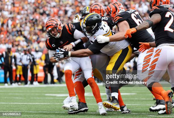 Defensive tackle Cameron Heyward of the Pittsburgh Steelers sacks quarterback Joe Burrow of the Cincinnati Bengals during the second half at Paycor...