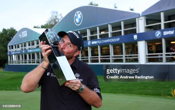 Shane Lowry of Ireland poses with the trophy after winning the BMW PGA Championship at Wentworth Golf Club on September 11, 2022 in Virginia Water,...