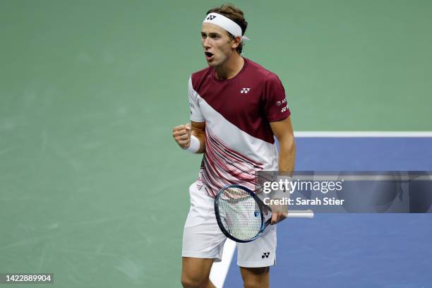 Casper Ruud of Norway celebrates winning the second set against Carlos Alcaraz of Spain during their Men’s Singles Final match on Day Fourteen of the...