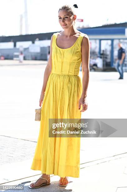 Olivia Palermo is seen wearing a yellow Jason Wu dress outside the Jason Wu show during New York Fashion Week S/S 2023 on September 10, 2022 in New...