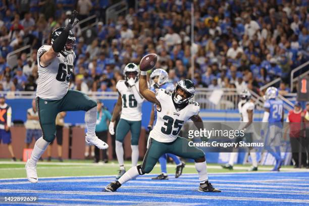 Boston Scott and Lane Johnson of the Philadelphia Eagles celebrate after a touchdown during the third quarter in the game against the Detroit Lions...