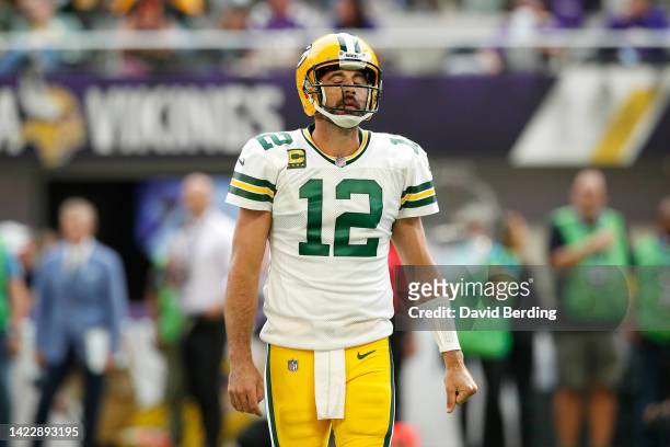 Aaron Rodgers of the Green Bay Packers reacts after a play during the second quarter in the game against the Minnesota Vikings at U.S. Bank Stadium...