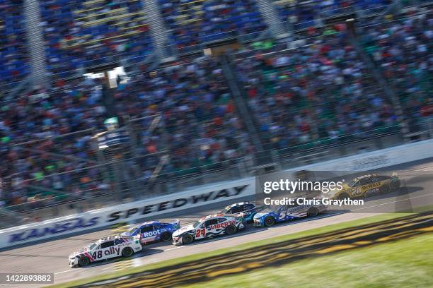 Alex Bowman, driver of the Ally Chevrolet, William Byron, driver of the Liberty University Chevrolet, Kyle Larson, driver of the HendrickCars.com...