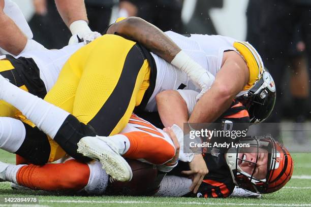 Linebacker Alex Highsmith of the Pittsburgh Steelers sacks quarterback Joe Burrow of the Cincinnati Bengals during the second half at Paycor Stadium...