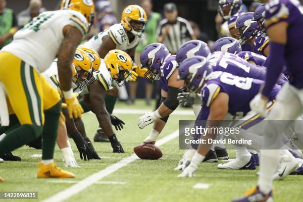 The Green Bay Packers and the Minnesota Vikings line up at the line of scrimmage in the first quarter of the game at U.S. Bank Stadium on September...