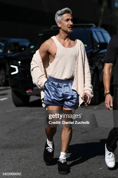 Tan France is seen wearing a white knit top and blue shorts outside the Altuzarra show during New York Fashion Week S/S 2023 on September 10, 2022 in...