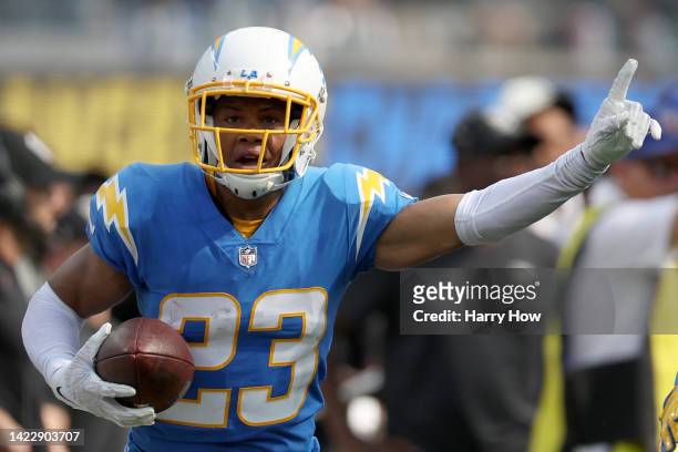 Cornerback Bryce Callahan of the Los Angeles Chargers celebrates an interception during the fourth quarter against the Las Vegas Raiders at SoFi...