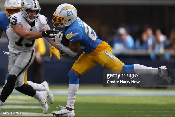 Cornerback Bryce Callahan of the Los Angeles Chargers intercepts a pass intended for wide receiver Hunter Renfrow of the Las Vegas Raiders during the...