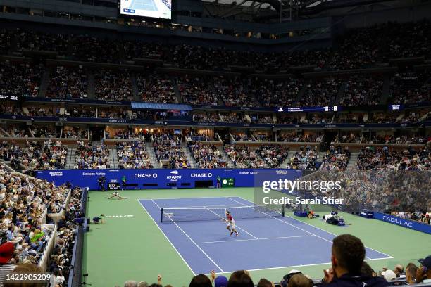 General view as Casper Ruud of Norway plays a smash against Carlos Alcaraz of Spain during their Men’s Singles Final match on Day Fourteen of the...