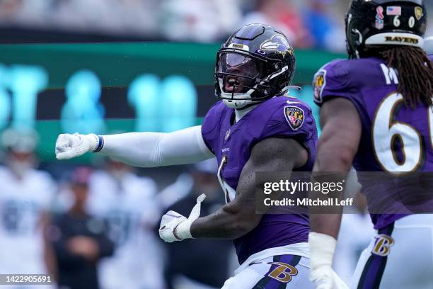 Patrick Queen of the Baltimore Ravens reacts after a sack during the third quarter against the New York Jets at MetLife Stadium on September 11, 2022...