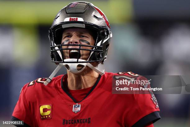 Tom Brady of the Tampa Bay Buccaneers yells as he takes the field before the game between the Tampa Bay Buccaneers and the Dallas Cowboys at AT&T...